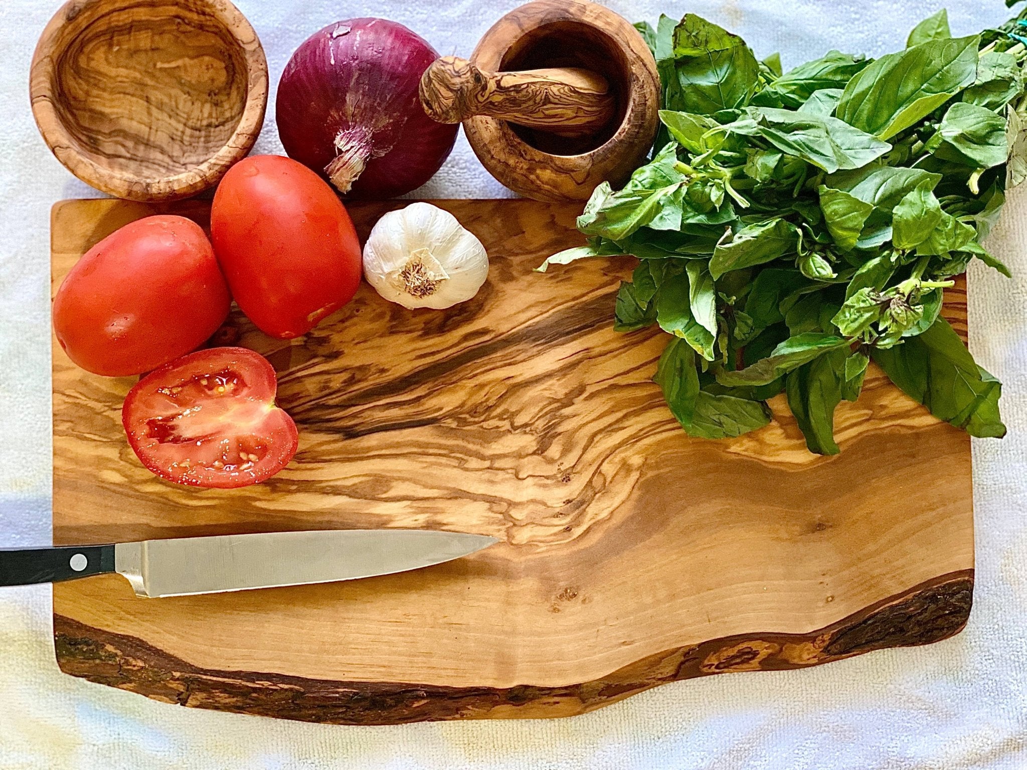 Rustic organic live edge olive wood cutting board tray